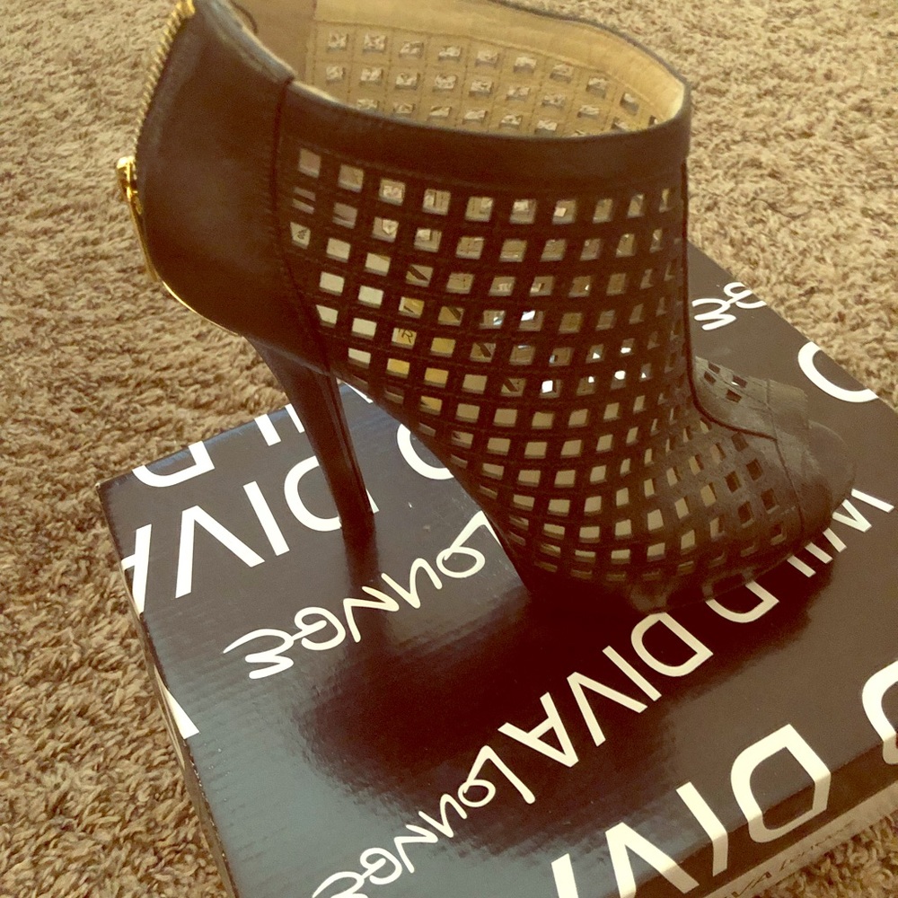 Gently used opened toe booties.
